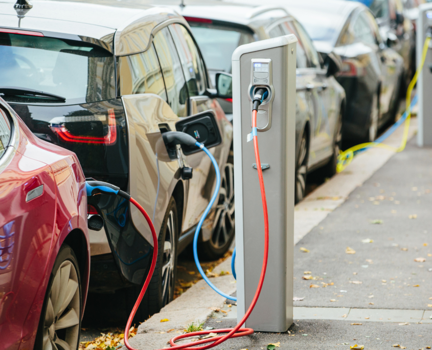 Vehicle with an electric motor. Electric vehicle charging. Eco car.
